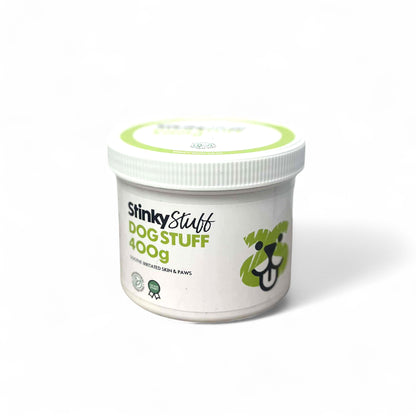 Container of 'Stinky Stuff' dog product on a white background