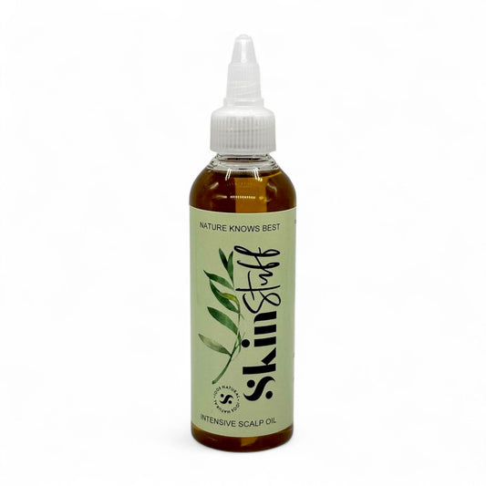Bottle of Intensive Scalp Oil with 'skinstuff' branding on a white background